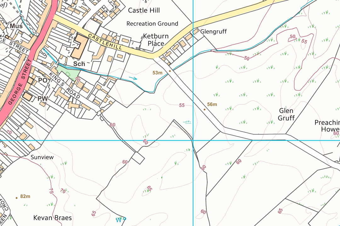 OS 10k raster section of a Welsh village with Castle Hill recreation ground and surrounding farmland with field boundaries and contour values