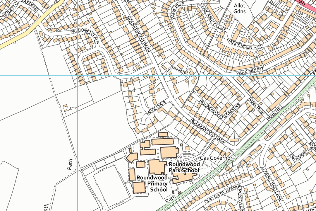 OS 10k raster section of a suburban area with schools park and residential crescents showing blue OS grid lines at 1 km intervals
