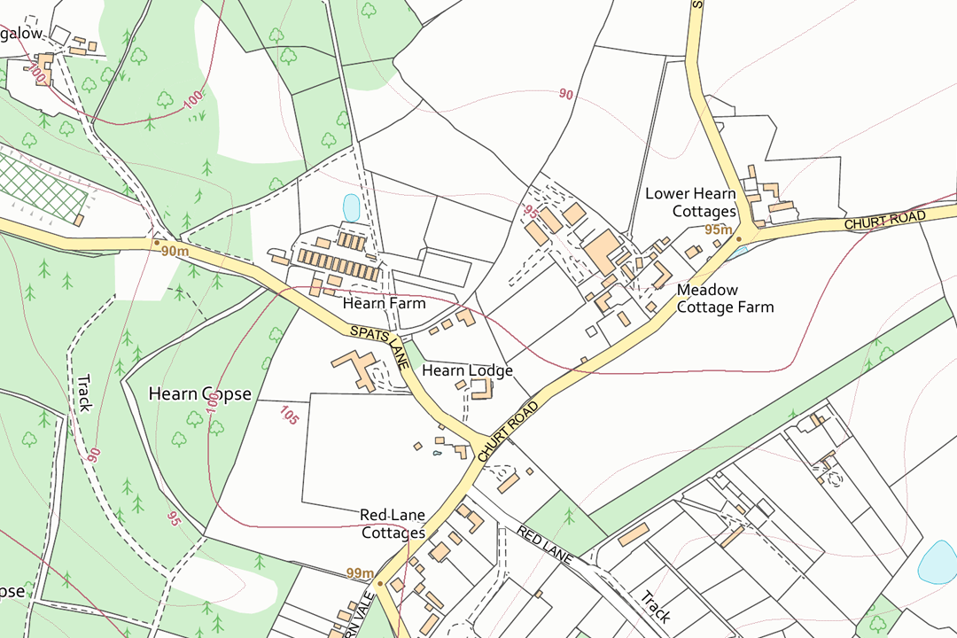 OS 10k raster GeoTIFF of a rural hamlet with scattered farms cottages and field boundaries surrounded by green woodland shading