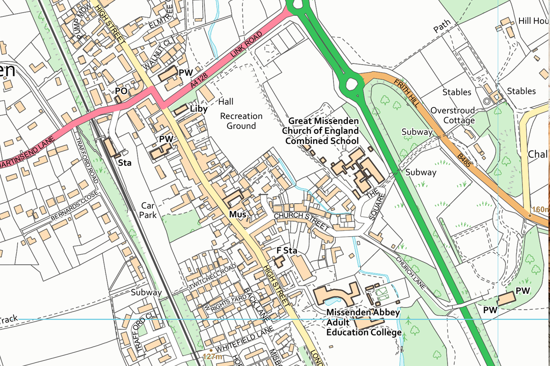 OS VectorMap Local raster showing a small town with recreation ground school roundabout and dual carriageway bypass