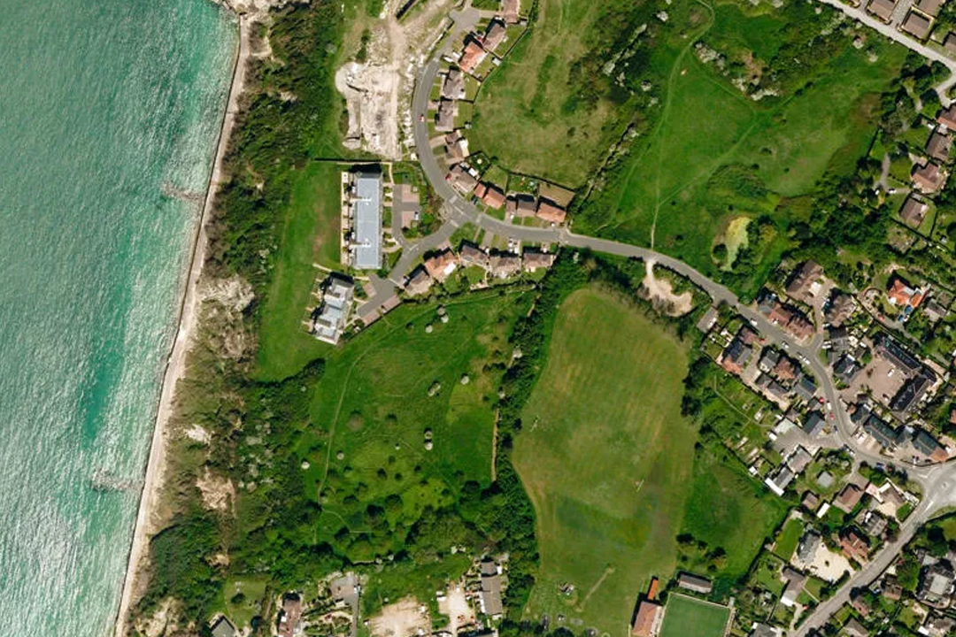 OS MasterMap Imagery Layer data showing a small area of coastline from above as an optional drape layer for 3D packages including AutoCAD and QGIS