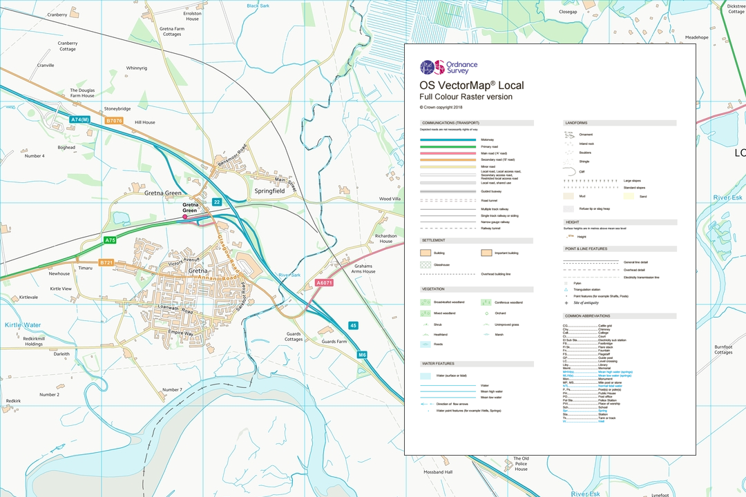 OS VectorMap Local colour data at 1:10 000 scale showing a town, river and road network with the OS product description alongside