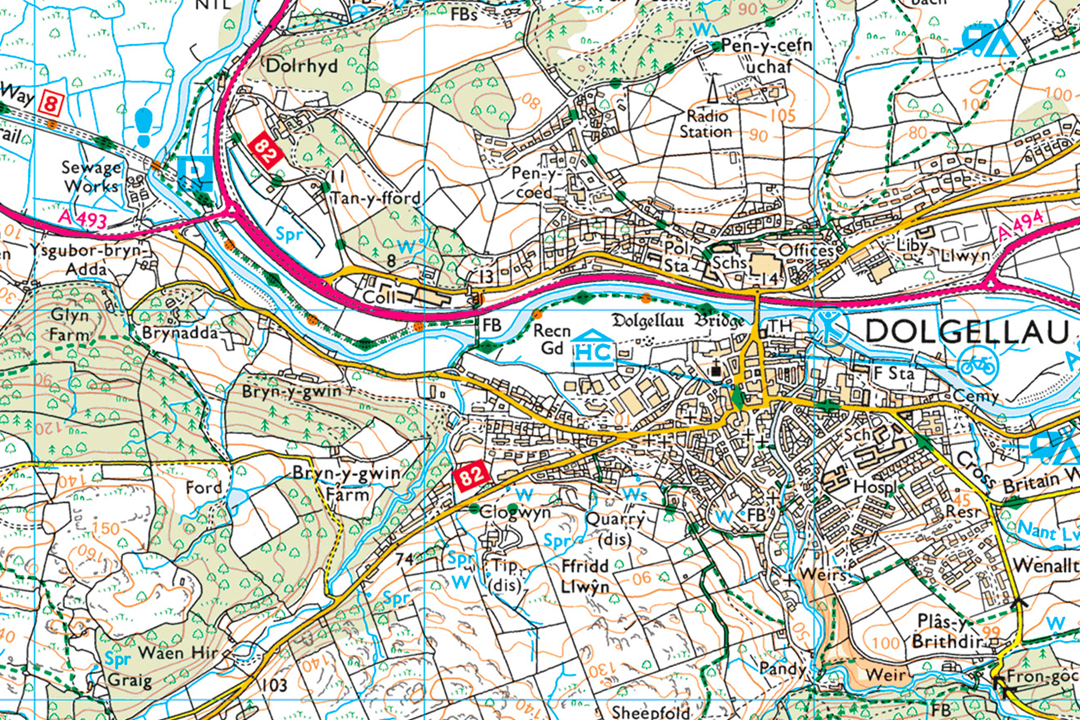 Close-up of OS 1:25 000 Explorer map data showing Dolgellau in Wales - green fields, contour lines, river, roads and woodland in a rural valley setting