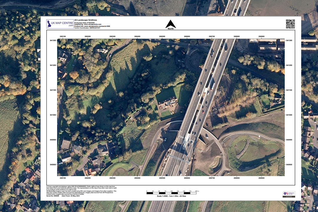 OS 1:2500 orthorectified aerial imagery extract showing a railway line, road junction, woodland and residential area in true top-down view