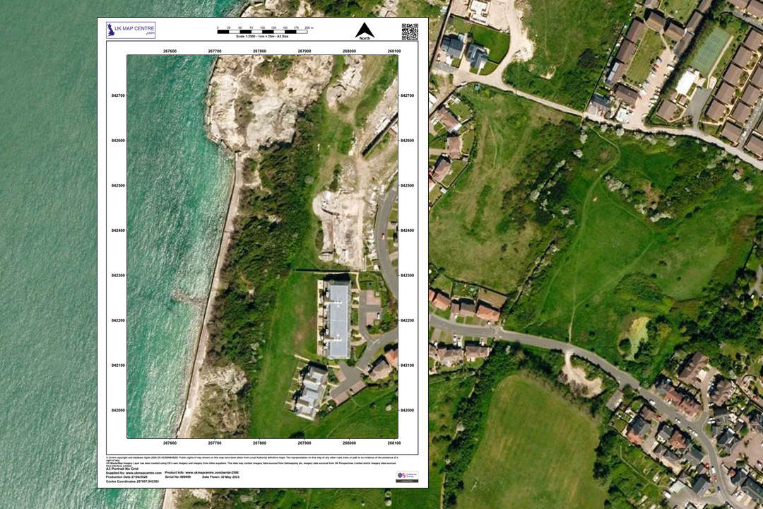 OS 1:2500 aerial extract of a coastal area overlaid on wider aerial photo - beach, cliffs, buildings and golf course green visible at 25 cm resolution