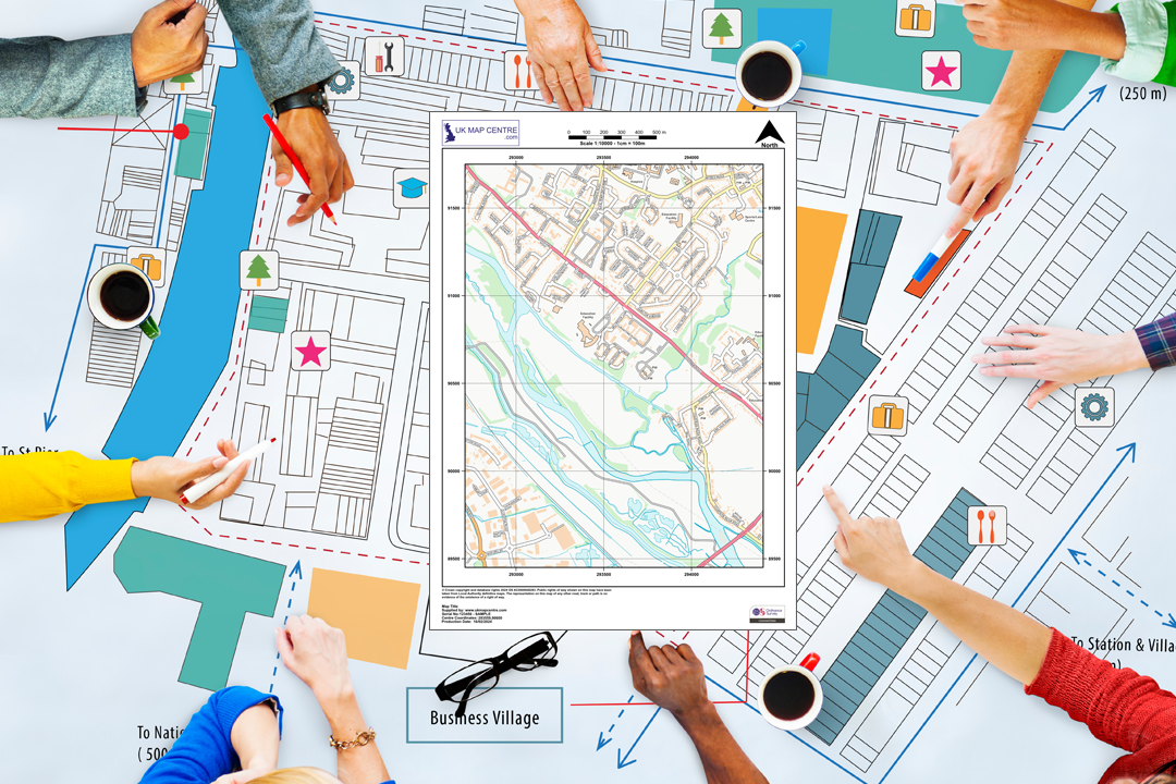 Multiple hands around a table with an OS street map extract in the centre surrounded by evacuation planning symbols - ideal for office and business evacuation packs